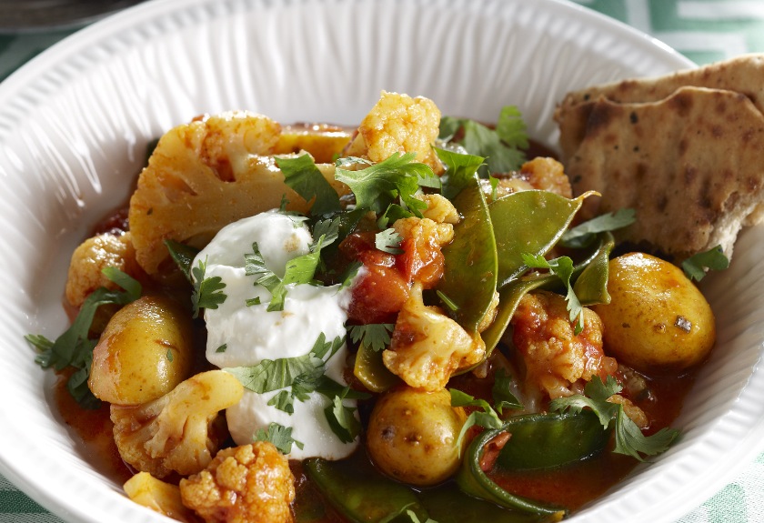 Curry van bloemkool, peultjes en aardappel