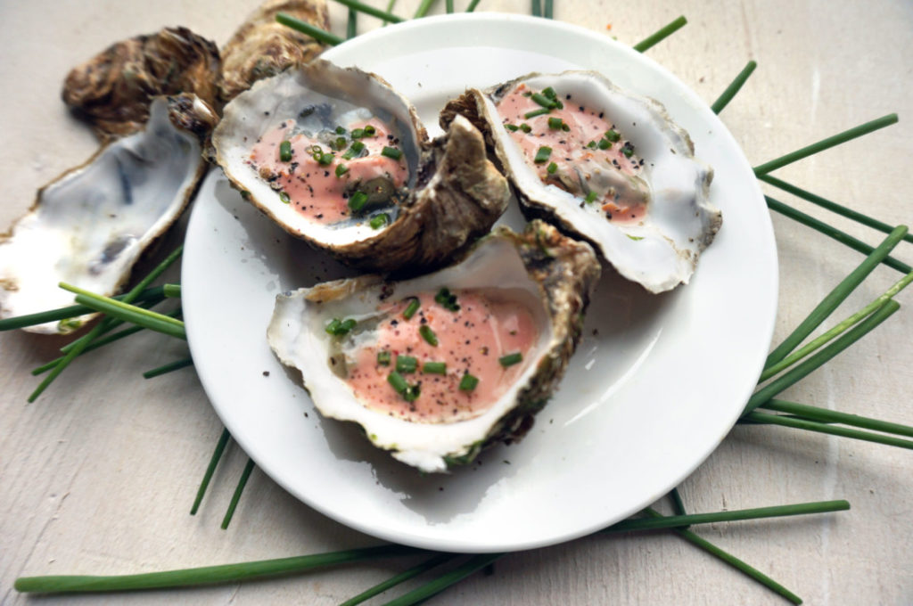 Oesters met bloedsinaasappelsaus uit de oven